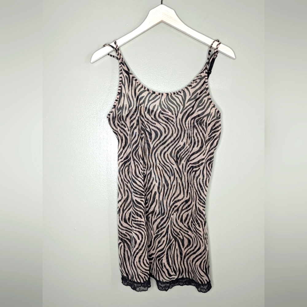 Beautiful animal print lingerie mesh dress. Medium, stretchy material. No panty